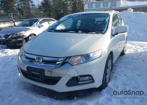 2012 Honda Insight from USA, damaged, VIN JHMZE2H37CS005710